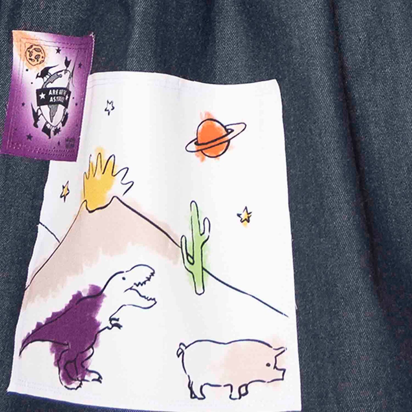 Gonna in denim blu con applicazioni