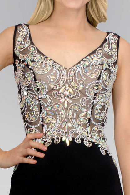 Abito lungo in jersey con corpetto trasparente decorato con gioielli 