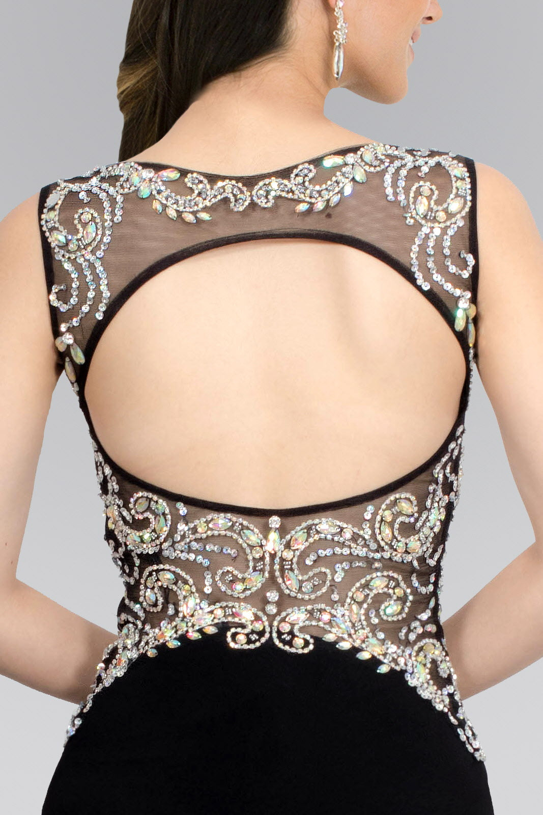 Abito lungo in jersey con corpetto trasparente decorato con gioielli 