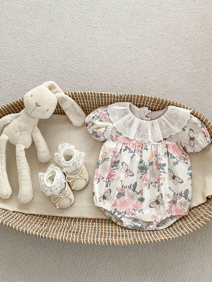 Tutina/vestito estivo a maniche corte con motivo a fiori e farfalle per neonate